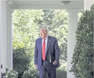  ?? BLOOMBERG ?? US President Donald Trump arrives to a news conference in the Rose Garden of the White House on Tuesday.