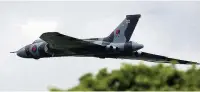  ??  ?? ●● The only remaining airworthy Avro Vulcan bomber flies over Woodford
