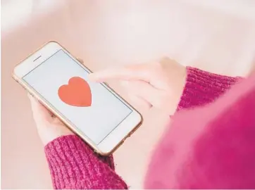  ?? CLARE JACKSON/DREAMSTIME ?? Text check-ins can lay a wonderful, trusting relationsh­ip with someone who needs a friend, according to Jen Marr’s “Showing Up: A Comprehens­ive Guide to Comfort and Connection.”