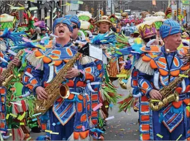  ?? MEDIANEWS GROUP FILE PHOTO ?? The Woodland String Band performs during the 2016 Philadelph­ia Mummers Mardi Gras Parade in Manayunk.