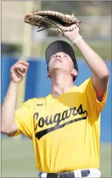  ?? Nikolas Samuels/The Signal ?? Josh Arkin (27) of College of the Canyons looks up to catch a foul ball on Thursday.