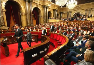  ?? — Reuters photo ?? PP’s deputies (People’s Party) of the Catalan regional Parliament leave the investitur­e session of Turull (who was imprisoned) as the new Catalan President at regional parliament in Barcelona, Spain.