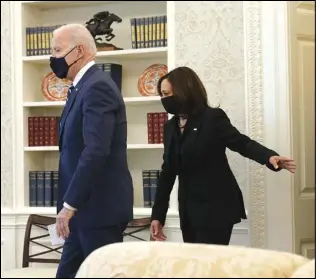  ?? ASSOCIATED PRESS ?? President Joe Biden and Vice President Kamala Harris arrive Thursday at the Oval Office of the White House in Washington.