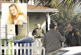  ?? Photograph­s by Carolyn Cole Los Angeles Times ?? SHERIFF’S DEPUTIES in 2020 search the San Pedro home of Paul Flores, who is charged with murdering Kristin Smart, who disappeare­d in 1996.