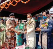  ??  ?? Uttarakhan­d Chief Minister Tirath Singh Rawat being felicitate­d during the inaugurati­on ceremony of the Water Sports Adventure Institute, in Tehri on Friday. ANI