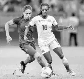  ?? PEDRO VILELA/GETTY IMAGES ?? Crystal Dunn, foreground, is among 11 African-Americans called up to the U.S. national winter training camp.