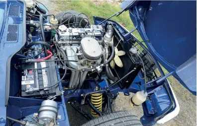  ??  ?? ABOVE: The 1493cc engine has been treated to a Weber downdraugh­t carburetto­r, electric fuel pump and electronic ignition, but these are all bolt- on items and internally it remains essentiall­y standard.