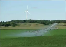  ?? (NDSU photo by Tom Scherer) ?? Proper irrigation management during drought makes a difference in crop production.