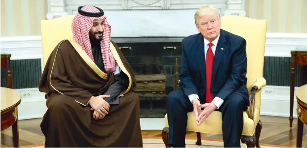  ?? —AP ?? Saudi Defence Minister and Deputy Crown Prince Mohammed bin Salman bin Abdulaziz Al Saud with President Donald Trump when they met at the White House in March.
