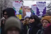  ?? MARKUS SCHREIBER — THE ASSOCIATED PRESS ?? Protestors attend a rally in support to the women of Iran and Afghanista­n on the Internatio­nal Women's Day in Berlin, Germany, on Wednesday.