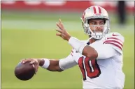  ?? Jed Jacobsohn / Associated Press ?? The 49ers’ QB Jimmy Garoppolo returns to New England for the first time Sunday, facing the team that drafted him.