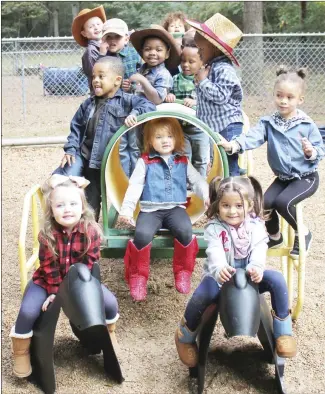  ?? Brodie Johnson • Times-Herald ?? Children at Teach and Tend Daycare have been celebratin­g Halloween all week with each day designated as a different dress-up day. Monday was pajama day, Tuesday was red, white and blue day and today is cowboy day. Thursday will be camouflage day and on Friday, children are allowed to wear their Halloween costumes.