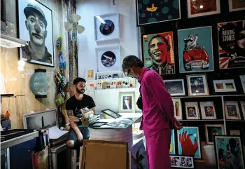  ?? ?? A man looks at artworks at La Fabrica de Arte Cubano (The Cuban Art Factory) in Havana.