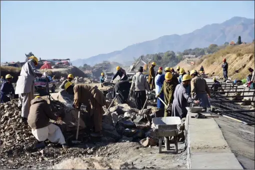  ?? The Associated Press ?? BELT AND ROAD INITIATIVE: In this Dec. 22, 2017, photo, work in progress at the site of Pakistan China Silk Road in Haripur, Pakistan. From Pakistan to Tanzania to Hungary, projects under Chinese President Xi Jinping’s signature “Belt and Road...