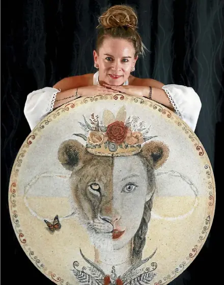  ??  ?? Nancy Tschetner creates highly detailed portraits and paintings using sand. She has recently been invited to be part of the prestigiou­s Women Art Exhibition to celebrate the Internatio­nal Women’s Day 2018. Read more on page 3.