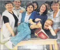  ?? SUBMITTED PHOTO ?? Wolfgang Jorn, lying on the table, in his English class with other newcomers to Canada in St. John’s.