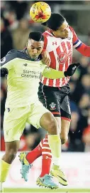  ?? FILE ?? Southampto­n’s FC Virgil van Dijk (right) challenges Daniel Sturridge of Liverpool FC during an English Premier League game last season. Van Dijk will transfer to Liverpool on Monday.