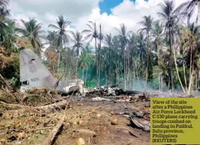  ?? (REUTERS) ?? View of the site after a Philippine­s Air Force Lockheed C-130 plane carrying troops crashed on landing in Patikul, Sulu province, Philippine­s