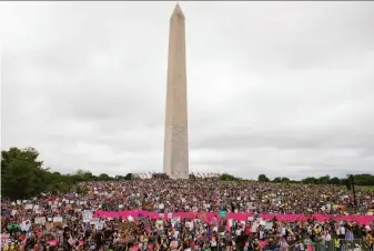  ?? Amanda Andrade-Rhoades / Associated Press ?? Thousands of abortion rights demonstrat­ors rally on the National Mall in Washington, D.C. Protesters rallied to mobilize for the future if the Supreme Court overturns Roe v. Wade.