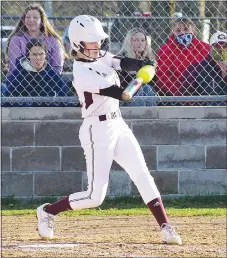  ?? Westside Eagle Observer/RANDY MOLL ?? Gentry’s Taylor Norman connects with a pitch during play against Mansfield at Gentry High School on Friday.