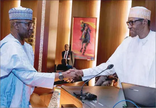  ??  ?? President Buhari in handshake with the new SGF Boss Mustapha in Aso Rock...Abuja