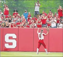  ?? OKLAHOMAN] ?? Oklahoma outfielder Nicole Mendes gestures to the crowd during Friday's NCAA Super Regional softball game against Northweste­rn. The Sooners beat the Wildcats 3-0 to move within a win of a Women's College World Series berth. [BRYAN TERRY/ THE