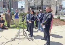  ?? ASHLEY LUTHERN / MILWAUKEE JOURNAL SENTINEL ?? Assistant Police Chief Nicole Waldner shares informatio­n with members of the media on Saturday about shootings that left 21 injured the previous night in downtown Milwaukee.