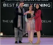  ?? ?? Srishti Mehra, manager PR & marketing communicat­ions, The Leela Palace, New Delhi receives the award for Megu, the winner of the Best Family Dining restaurant in a hotel.