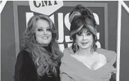  ?? John Amis / Associated Press ?? Naomi Judd, right, died Saturday. With her daughter Wynona, left, Naomi was part of The Judds.