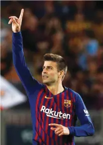  ?? – Reuters ?? GOAL BOUND: Barcelona’s Gerard Pique celebrates scoring their second goal.