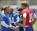  ?? MARK J. TERRILL / AP ?? In this June 5, 2017, file photo, Rams coach Sean McVay, left, talks with quarterbac­k Jared Goff, right, as offensive coordinato­r Matt LaFleur stands between them during practice in Thousand Oaks.