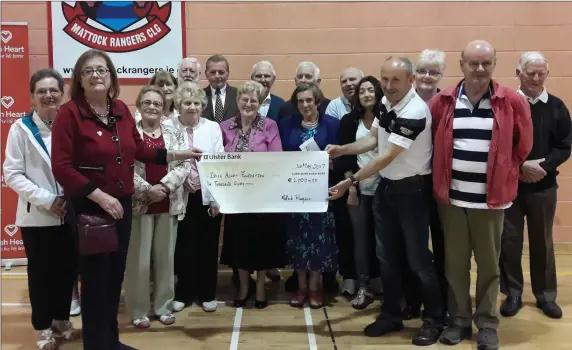  ??  ?? Mark Leacy (vice chairman of Mattock Rangers) presenting a cheque to Dr Kate McGarry President of Irish Heart, proceeds from a fun run held in memory of the late Gerard Wogan, also in picture l to r - Kathleen Cassidy, Lily Kirk, Rosemary McDonnell,...