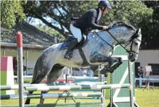  ?? Picture: MARK CARRELS ?? RIDING HIGH: Lloyd Nicholls riding Eagles Christophe­r Robin jumps a hurdle during the showjumpin­g event at the Bathurst Agricultur­al Show.