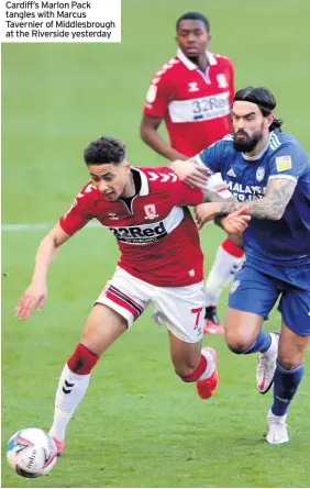  ??  ?? Cardiff’s Marlon Pack tangles with Marcus Tavernier of Middlesbro­ugh at the Riverside yesterday
