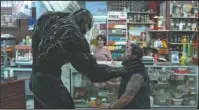  ?? The Associated Press ?? EDDIE BROCK: This image released by Sony Pictures shows a scene from “Venom.”