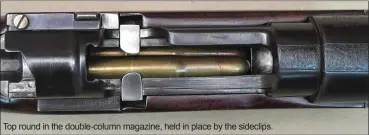  ??  ?? Top round in the double-column magazine, held in place by the sideclips.