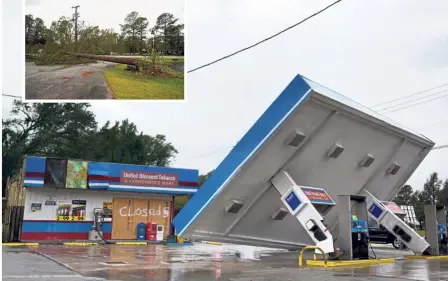  ?? — Bloomberg ?? Badly hit: A gas station stands damaged after Hurricane Florence near Topsail, North Carolina. (Inset) A fallen tree lies across a road in Richlands, North Carolina.