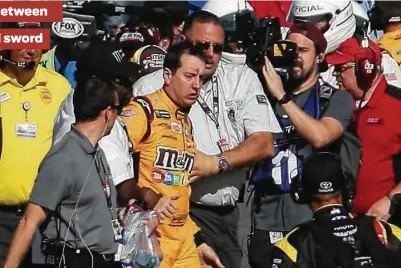  ?? Chris Graythen / Getty Images ?? Kyle Busch took it on the chin following a post-race brawl with Joey Logano, but the incident boosted NASCAR’s national profile among the mainstream media.
