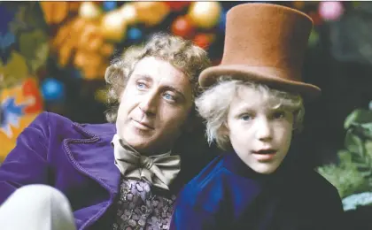 ?? PARAMOUNT PICTURES ?? Gene Wilder, left, and Peter Ostrum star in 1971's Willy Wonka & the Chocolate Factory, based on one of Roald Dahl's many books.