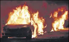  ?? AFP ?? Cars torched by protesters a few blocks from the County Court House during a protest against the shooting of Jacob Blake.