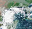 ?? AP ?? This satellite image provided by NOAA shows Tropical Storm Nicholas in the Gulf of Mexico on Sunday.