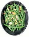  ?? 123RF.COM ?? Green beans with toasted almonds are shown in this photo. Margaret Prouse has recently revisted her recipe for Green Beans with Onions and Almonds.