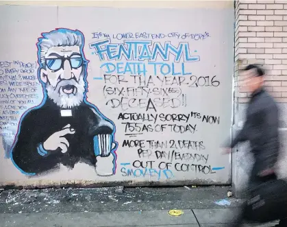  ?? THE CANADIAN PRESS FILES ?? Street artist Smokey D.’s mural in the Downtown Eastside paints a vivid picture of the fentanyl and opioid overdose crisis. Michael McPhie sees the problem as one that requires the same attention as the wildfires raging through the province.