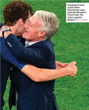  ?? GETTY IMAGES ?? Delighted French coach Didier Deschamps hugs defender Benjamin Pavard after the victory against Belgium