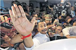  ??  ?? Kuldeep Singh Sengar, a legislator of Uttar Pradesh state from India’s ruling BJP party, leaves court after he was arrested on Friday in connection with the rape of a teenager