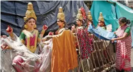  ?? — PTI ?? Idols are kept out for drying at a workshop during Unlock 3.0 at Kumartuli in Kolkata on Friday.