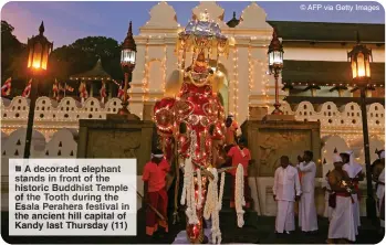  ?? ?? ecorated phan stands front of he historic uddhist Temple
he ooth urin the Esala Perahera estiva in the ancient hill capital of Kandy last Thursday (11)
© AFP via Getty Images