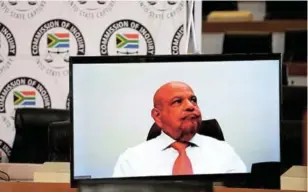  ??  ?? Public Enterprise­s Minister Pravin Gordhan at state capture inquiry.