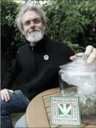  ?? THE ASSOCIATED PRESS ?? Dale Gieringer of NORML (National Organizati­on for the Reform of Marijuana Laws) poses for photos at his house in Berkeley, Calif.