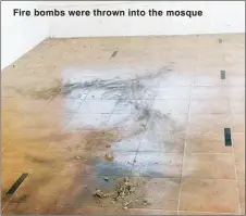  ??  ?? Fire bombs were thrown into the mosque